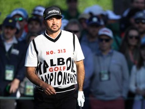 Jason Day of Australia prepares for a shot on the 17th tee during the continuation of the first round of the 2024 Masters Tournament at Augusta National Golf Club on April 12, 2024 in Augusta, Ga.