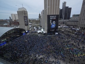 Crowds watch during the second round of the NFL football draft, Friday, April 26, 2024, in Detroit.