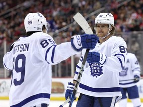 Nicholas Robertson #89 of the Toronto Maple Leafs celebrates his goal with teammate William Nylander #88 during the first period against the New Jersey Devils at Prudential Center on April 9, 2024 in Newark, N.J.