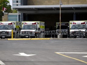Ontario will provide free bereavement counselling for two years to families of first responders who have died in the line of duty and those who died by suicide. Ambulances are parked outside the Emergency Department at the Ottawa Hospital Civic Campus in Ottawa on Monday, May 16, 2022.