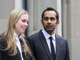 Umar Zameer reacts beside lawyer Alexandra Heine during a press conference following his not-guilty verdict, in Toronto, Sunday, April 21, 2024.