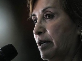 FILE - Peru's President Dina Boluarte talks to the press at the end of the Amazon Summit in Belem, Brazil, Aug. 8, 2023. Boluarte testified to prosecutors behind closed doors Friday, April 5, 2024, as authorities investigate whether she illegally received hundreds of thousands of dollars in cash, luxury watches and jewelry.