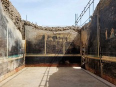 This handout picture released by the archaelogical park of Pompeii on April 11, 2024 shows new frescoes in a banqueting room with black walls part of the ongoing excavations in the block 10 of Regio IX, in Pompeii, near Naples.