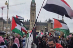 Screengrab from video posted to X of a protest in Ottawa at Parliament Hill on Saturday, April 20, 2024.