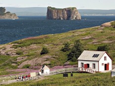 Tens of thousands of visitors flock to Quebec's storied Iles-de-la-Madeleine every summer to behold its cliff-framed seascapes and wide sandy beaches. But starting next month, those island sojourns will come with an added cost. The Bonaventure Island is shown overlooking the Perce rock on July 25, 2012.