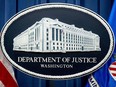 A U.S. Department of Justice sign