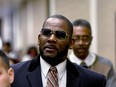 R. Kelly leaves the Daley Center after a hearing in his child support case May 8, 2019, in Chicago.