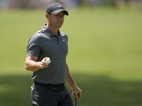 Rory McIlroy, of Northern Ireland, waves after making a putt on the sixth hole during the second round of the RBC Heritage golf tournament, Friday, April 19, 2024, in Hilton Head Island, S.C.