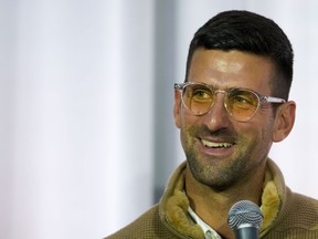 Serbian tennis player Novak Djokovic smiles during a press conference after the screening of the documentary film about Croatian tennis legend Niki Pilic, former tennis player and former trainer of Novak Djokovic, Boris Becker and Goran Ivanisevic, in Belgrade, Serbia, Thursday, March 28, 2024. Top-ranked Novak Djokovic has split with coach Goran Ivanisevic, ending their association that began in 2018 and included 12 Grand Slam titles for the Serbian tennis player.