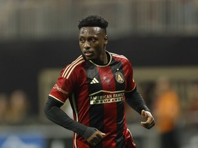 Atlanta United's Derrick Etienne Jr. (18) runs during the first half of an MLS soccer match against DC United, Saturday, June 10, 2023, in Atlanta. Toronto FC added to its attack Wednesday by acquiring Haiti international winger Etienne Jr. from Atlanta United FC in exchange for up to $375,000 in 2025 general allocation money.