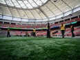 Crews work on the turf at B.C. Place during a FIFA World Cup 2026 update in Vancouver, Tuesday, April 30, 2024.