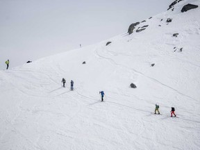 In this file photo taken on March 22, 2024, ski mountaineers are climbing the Col de la Chaux pass above Verbier in the Swiss alps.