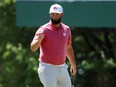 Jon Rahm of Spain reacts after making birdie on the third green during the final round of the 2024 Masters Tournament at Augusta National Golf Club on April 14, 2024 in Augusta, Georgia.