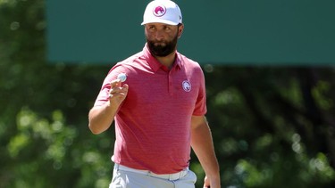 Jon Rahm of Spain reacts after making birdie on the third green during the final round of the 2024 Masters Tournament at Augusta National Golf Club on April 14, 2024 in Augusta, Georgia.