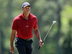 Tiger Woods of the United States walks to the 18th green during the final round of the 2024 Masters Tournament at Augusta National Golf Club on April 14, 2024 in Augusta, Ga.