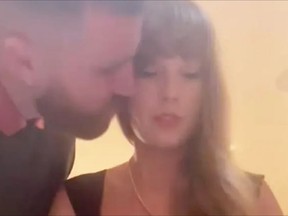 Travis Kelce is seen kissing Taylor Swift in a YouTube Shorts video posted on Swift's YouTube channel.