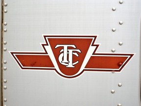 The TTC logo is seen on a subway car.