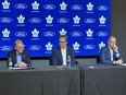 From left: Keith Pelley, Brendan Shanahan and Brad Treliving speak at the Maple Leafs season-ending news conference.