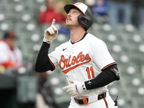 Jordan Westburg of the Baltimore Orioles celebrates a lead-off home run in the first inning against the Blue Jays.