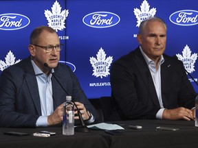Toronto Maple Leafs new head coach Craig Berube (right) and GM Brad Trelviing speak at a news conference.