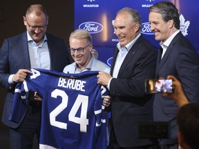 From left: Toronto Maple Leafs GM Brad Treliving, MLSE CEO Keith Pelley, Craig Berube and Brendan Shanahan pose for a photo.