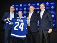 From left: Toronto Maple Leafs GM Brad Treliving, MLSE CEO Keith Pelley, Craig Berube and Brendan Shanahan pose for a photo.