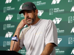 Aaron Rodgers of the New York Jets speaks to the media during the New York Jets OTAs.