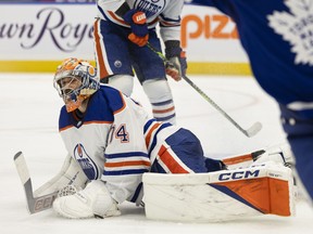 Edmonton Oilers goaltender Stuart Skinner reacts after giving up a goal as Toronto Maple Leafs' Morgan Rielly.