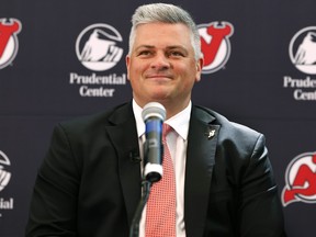 New Jersey Devils new head coach Sheldon Keefe smiles during press conference.