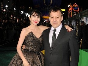 Director Sam Raimi (R) and wife Gillian attend the world premiere of Walt Disney Pictures' "Oz The Great And Powerful" at the El Capitan Theatre on February 13, 2013 in Hollywood, California.