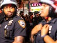 New York City police arrest demonstrators.