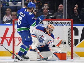 Stuart Skinner #74 of the Edmonton Oilers saves a shot on goal by Brock Boeser #6 of the Vancouver Canucks during the second period in Game One of the Second Round of the 2024 Stanley Cup Playoffs at Rogers Arena on May 08, 2024 in Vancouver, British Columbia.