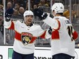 Anton Lundell of the Florida Panthers celebrates a goal with Evan Rodrigues.