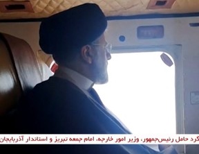 This grab taken from handout video footage released by the IRINN Iranian state television network on May 19, 2024 shows Iran's President Ebrahim Raisi on board a helicopter in the Jolfa region of the western province of East Azerbaijan.