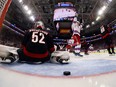 Artemi Panarin of the New York Rangers scores the game winning goal past Pyotr Kochetkov of the Carolina Hurricanes during the first overtime in Game 3 of the Second Round of the 2024 Stanley Cup Playoffs at PNC Arena on May 9, 2024 in Raleigh, N.C.
