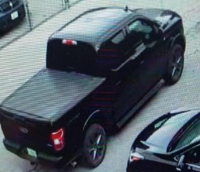 Investigators need help identifying three men and a black pickup truck sought in connection with a pharmacy robbery in Aurora on Tuesday, May 28, 2024.