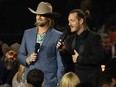 Brian Kelley and Tyler Hubbard of Florida Georgia Line speak during the 55th annual Country Music Association awards at the Bridgestone Arena on Nov. 10, 2021 in Nashville.
