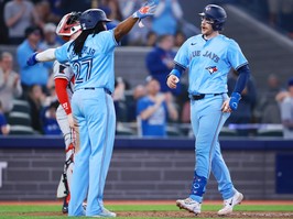 Blue Jays catcher Danny Jansen, right, celebrates with Vladimir Guerrero Jr. after hitting a two-run home run in the fifth inning against the Twins at Rogers Centre in Toronto, Saturday, May 11, 2024.