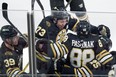 Bruins winger David Pastrnak (88) celebrates his OT goal versus Toronto, eliminating the Leafs from the playoffs. AP