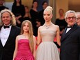 From left to right: Australian producer Doug Mitchell, U.S. actress Alyla Browne, British-U.S. actress Anya Taylor-Joy and Australian director and screenwriter George Miller arrive for the screening of the film "Furiosa: A Mad Max Saga" at the 77th edition of the Cannes Film Festival in Cannes, southern France, on May 15, 2024.