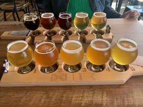 Welcome aboard the flight deck at Mike Hess Brewing in Seaport Village, craft beer and food within sight of huge aircraft carriers in San Diego Harbour.
