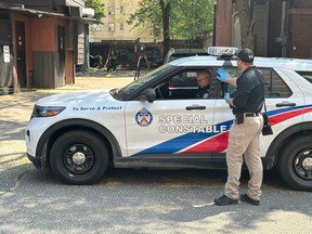 Toronto Police at the scene of a shooting on Wednesday, May 22, 2024 in the Sherbourne and Isabella area.