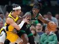 ​Boston Celtics guard Jrue Holiday, right, is defended by Indiana Pacers guard Andrew Nembhard during the first half of Game 2 of the NBA Eastern Conference basketball finals Thursday, May 23, 2024, in Boston.