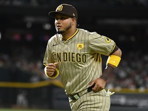 Luis Arraez of the San Diego Padres prepares for a game against the Arizona Diamondbacks at Chase Field in Phoenix, May 4, 2024.