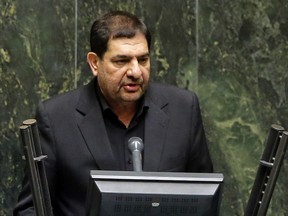 Iran's interim President Mohammad Mokhber addresses lawmakers