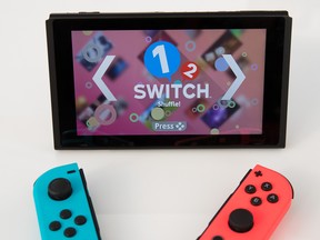 The Nintendo Switch game console is displayed