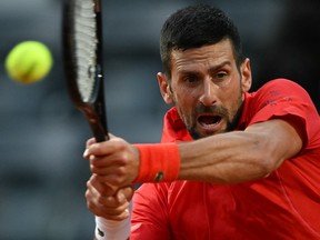 Novak Djokovic returns to Corentin Moutet during the Rome Open at Foro Italico in Rome, Italy, Friday, May 10, 2024.