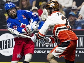 Tom Schreiber (left) and the Toronto Rock couldn't get much going against the Buffalo Bandits Friday night. Ryan McCullough / Toronto Rock