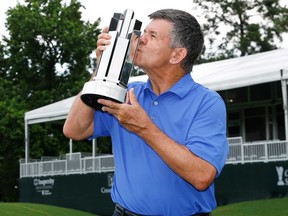 Scott Dunlap of the United States poses with the trophy after winning the Insperity Invitational after the final round was cancelled due to weather at The Woodlands Golf Club on May 5, 2024 in The Woodlands, Texas.