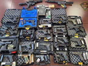 A vehicle stop in Cornwall led to the seizure of 26 illegal handguns, two illegal assault-style rifles, 37 boxes of ammunition, 20 prohibited overcapacity magazines, 74 magazines, one Glock upper receiver and a cellphone on Wednesday, May 22, 2024.